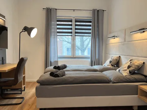 BASSWOODROOMS & APPARTMENTS  24/7 Telefonische Hotline - 2