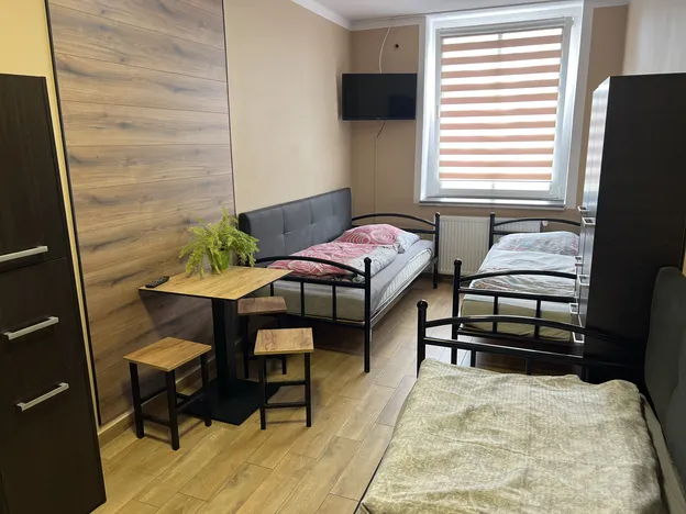 Apartamenty,  pokoje, mieszkania