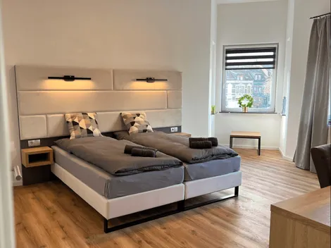 BASSWOODROOMS & APPARTMENTS  24/7 Telefonische Hotline - 5