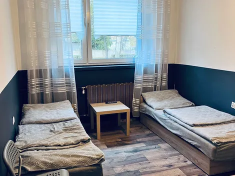 Pokoje 2 os. z łazienkami i TV dla pracowników - Hostel Pracowniczy