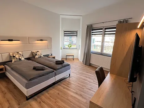 BASSWOODROOMS & APPARTMENTS  24/7 Telefonische Hotline