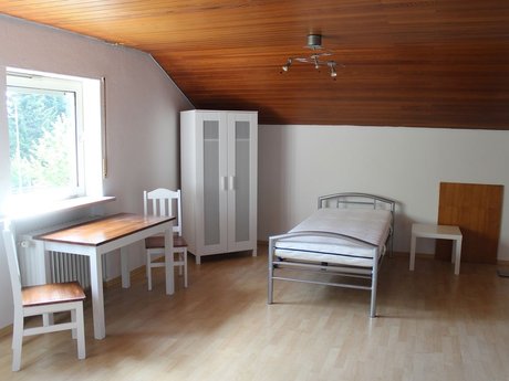 Pokój na poddaszu dla robotników